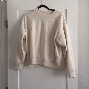Tan crew neck sweater with rhinestones